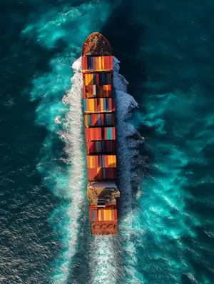 Container ship sailing in the sea.webp
