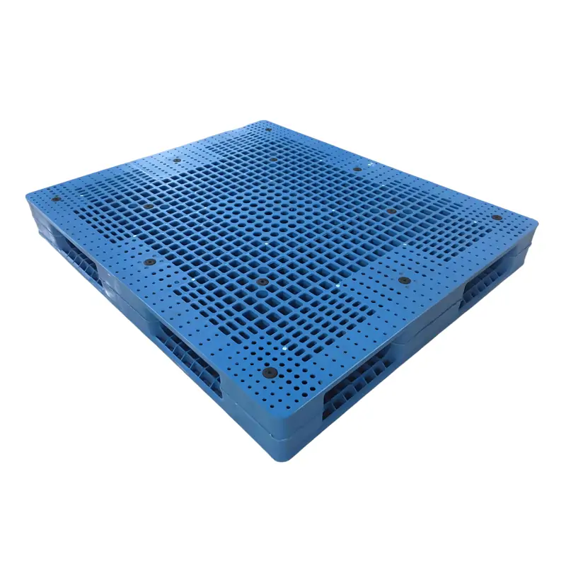 Reversible plastic pallet showing both sides design